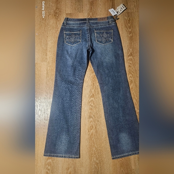 Classic Blue Boot Cut Jeans with Subtle Distressing - Picture 7 of 8